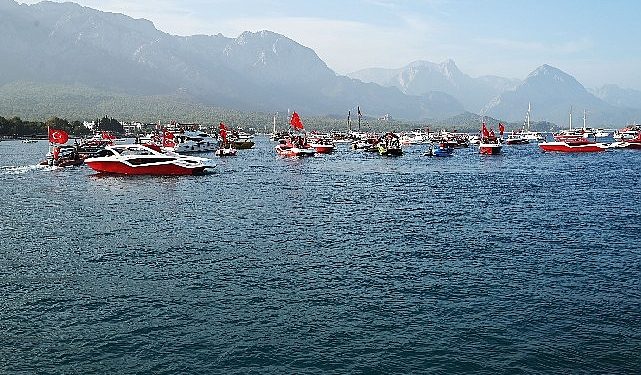 100 tekneden bayrak geçişi